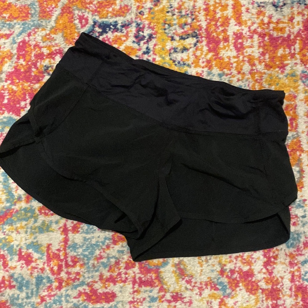 Black Lululemon Speed Up High-Rise Lined Short 2.5" with back zipper and pocket